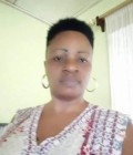 Muriel 48 ans Catholique  Cameroun