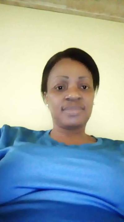 Muriel 48 ans Catholique  Cameroun