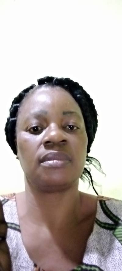 Muriel 48 ans Catholique  Cameroun